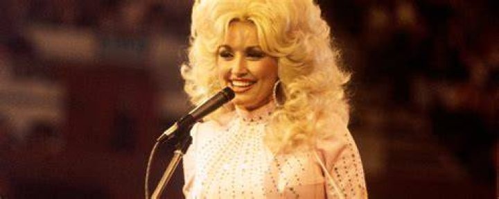
Dolly Parton Says She’s Happy to be ‘Second in Line’ to ‘Queen of Christmas’ Mariah Carey 